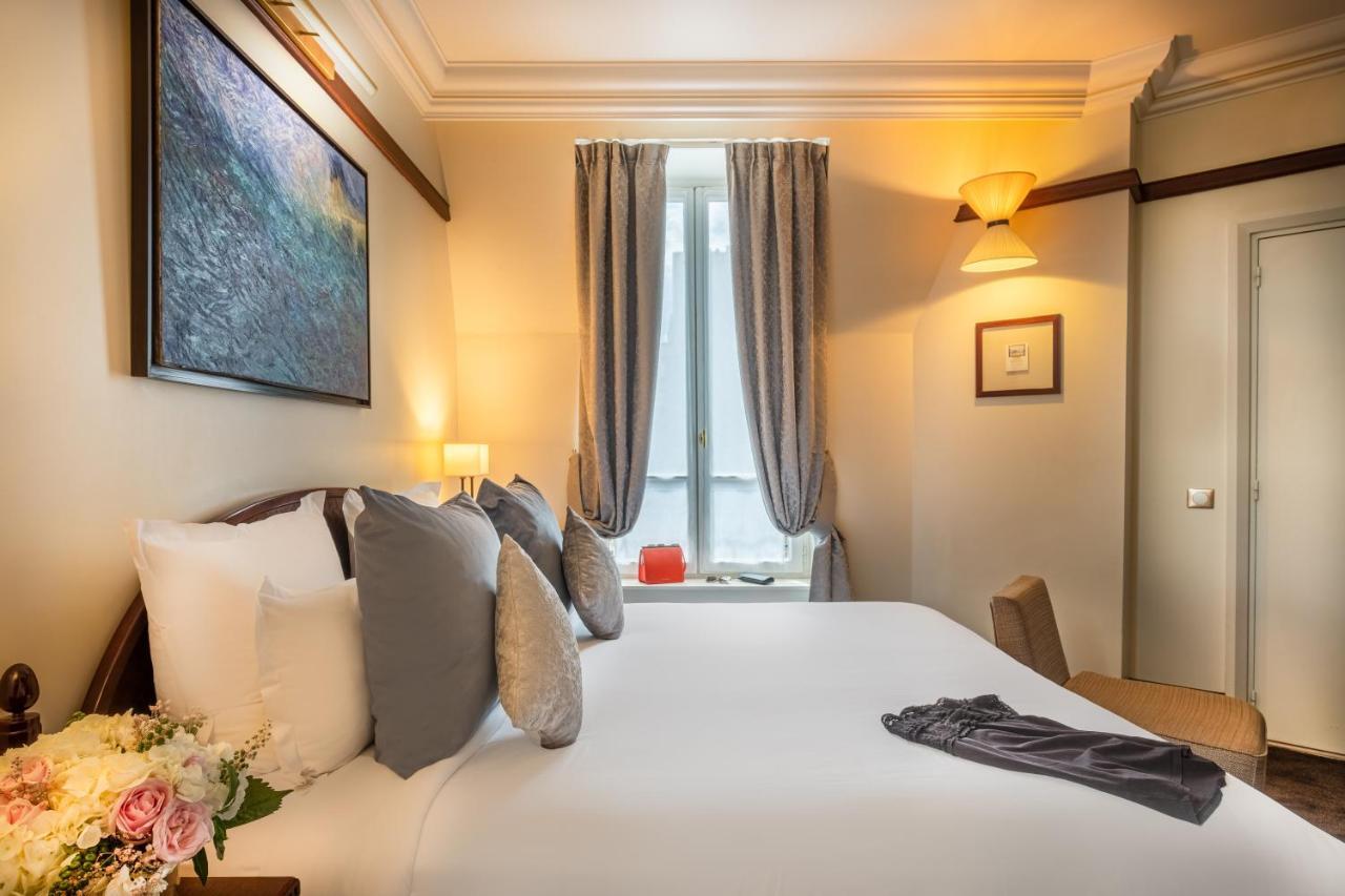 Hotel Pont Royal Paris Bagian luar foto A room at the hotel